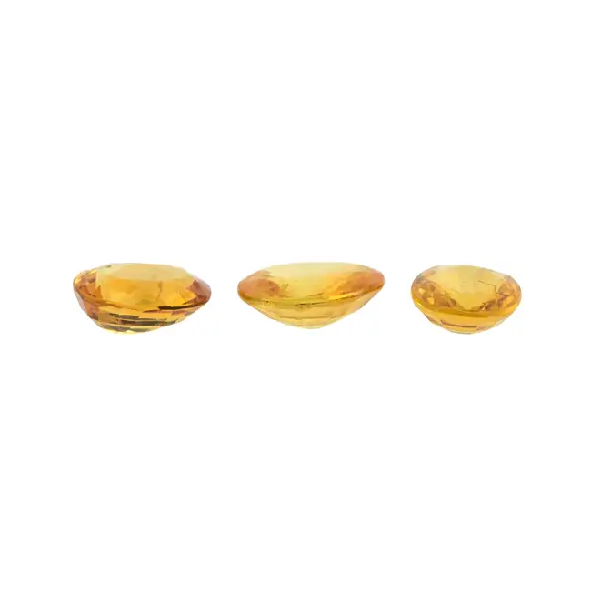 Three oval-shape orange sapphires, 5.13ct