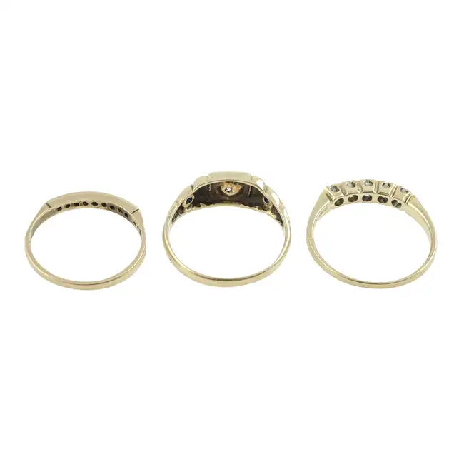 Three 9ct gold diamond rings