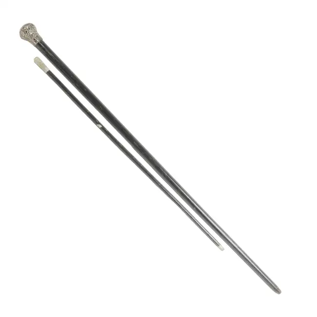Silver topped walking cane and one other
