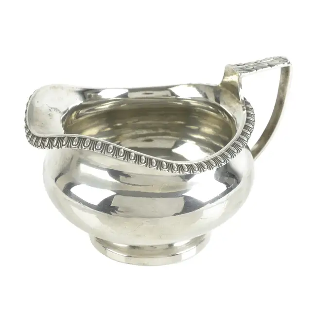 Late George III silver cream jug 