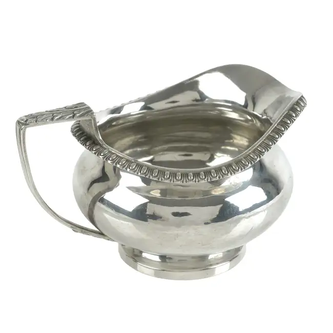 Late George III silver cream jug 
