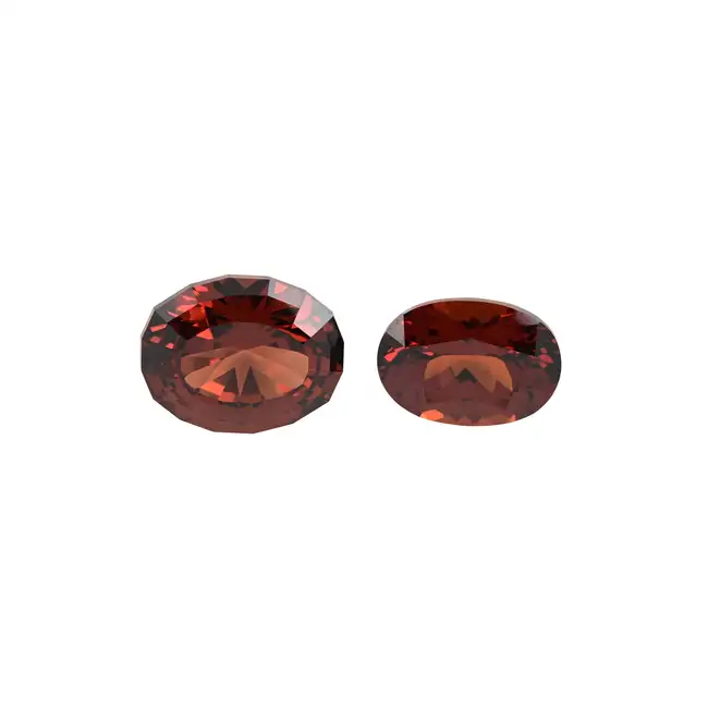 Two oval-shape orangy-red garnets, 4.03ct