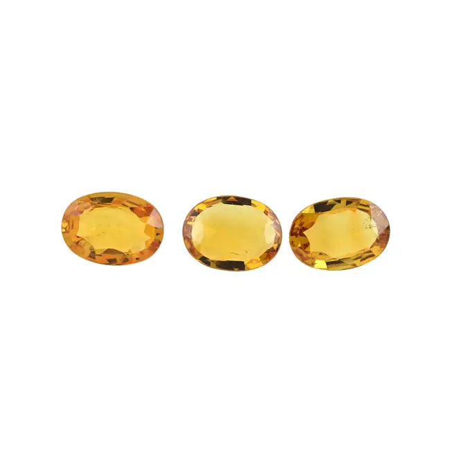 Three oval-shape orange sapphires, 5.72ct