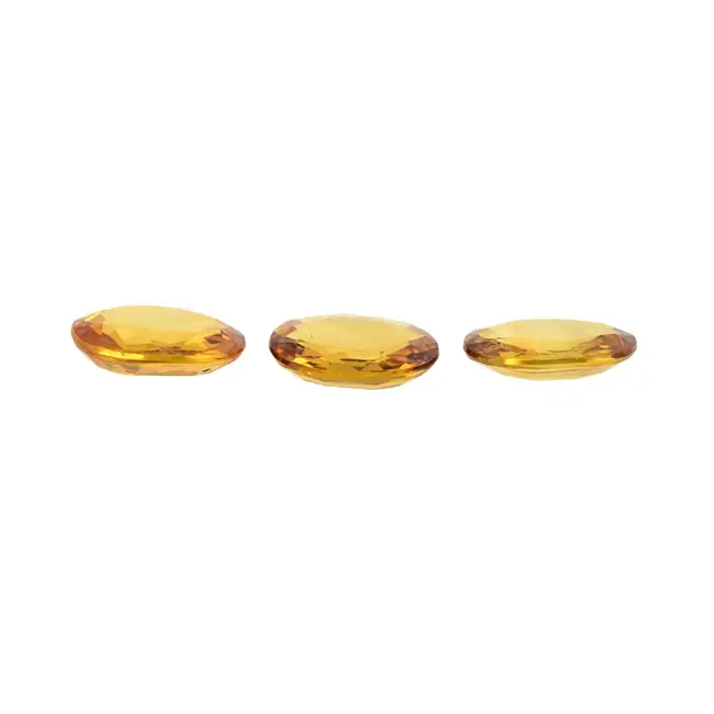 Three oval-shape orange sapphires, 5.72ct