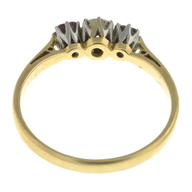 Mid 20th 18ct gold ruby & diamond three-stone ring