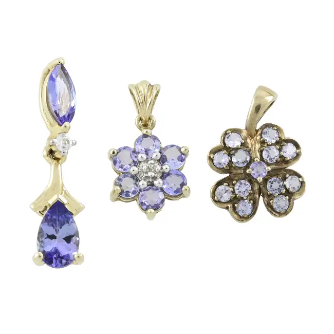 Three 9ct gold tanzanite pendants