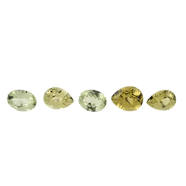 Five vari-shape green garnets, 6.52ct
