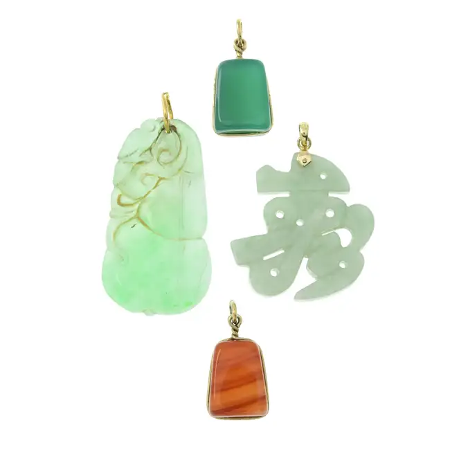 Four gem-set pendants