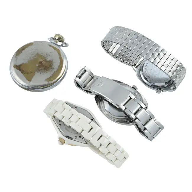 Three watches and a pocket watch.