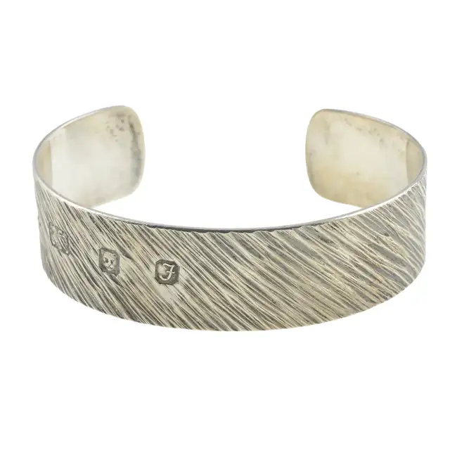 Silver bangle, by Gerald Benney
