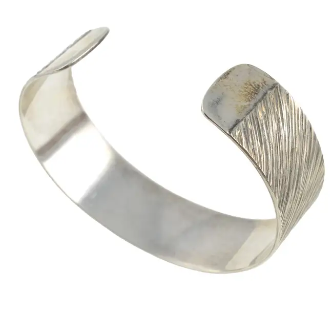 Silver bangle, by Gerald Benney