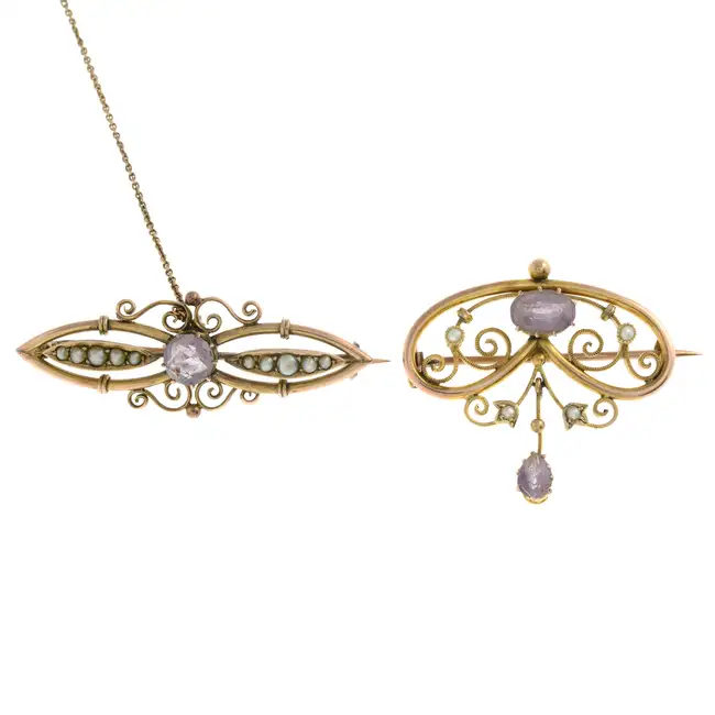 Two early 20th c. amethyst & split pearl brooches