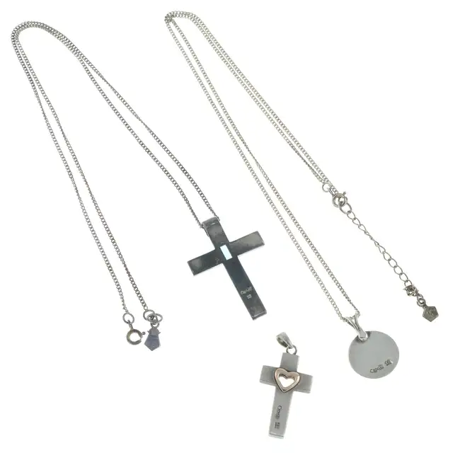 Three pendants, two with silver chain, by Clogau