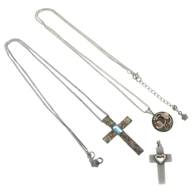 Three pendants, two with silver chain, by Clogau