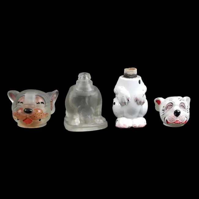 Two scent bottles modelled as Bonzo