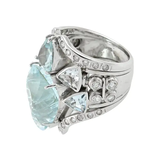 Carved aquamarine and diamond stylised insect ring