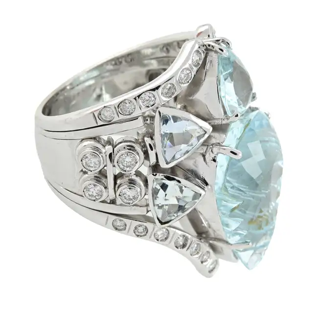 Carved aquamarine and diamond stylised insect ring