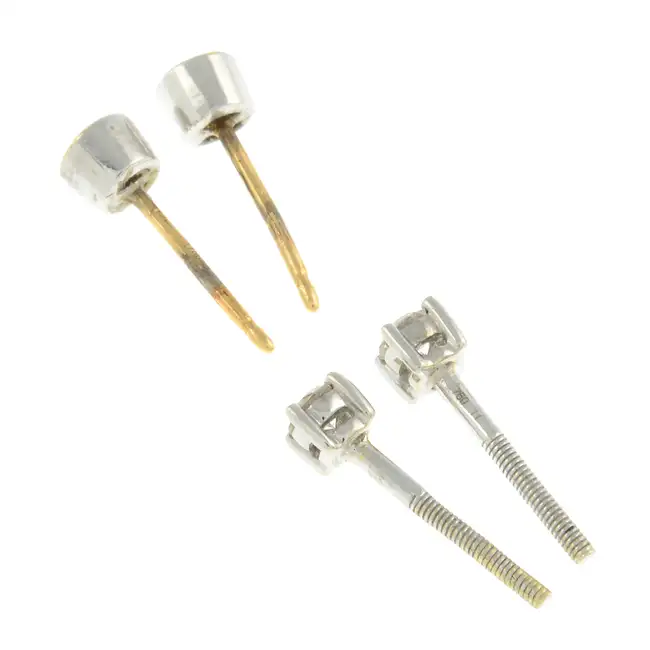 Two pairs of diamond stud earrings