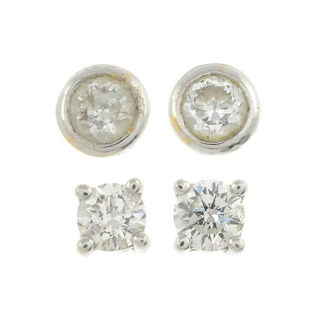 Two pairs of diamond stud earrings