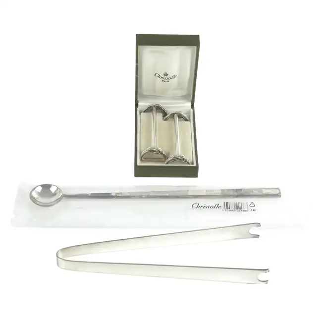 Christofle knife rests, tongs & cocktail spoon (3)