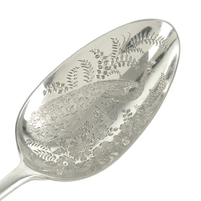 Two George III silver table spoons, later engraved