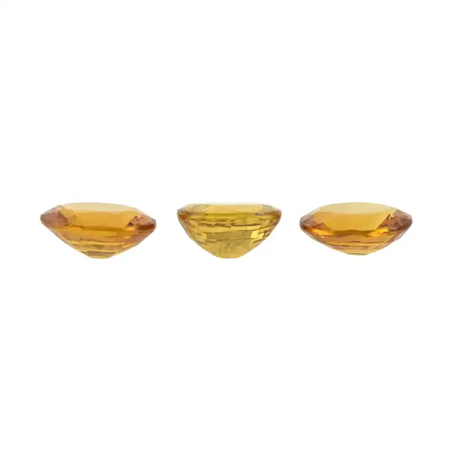 Three oval-shape orange sapphires, 5.28ct