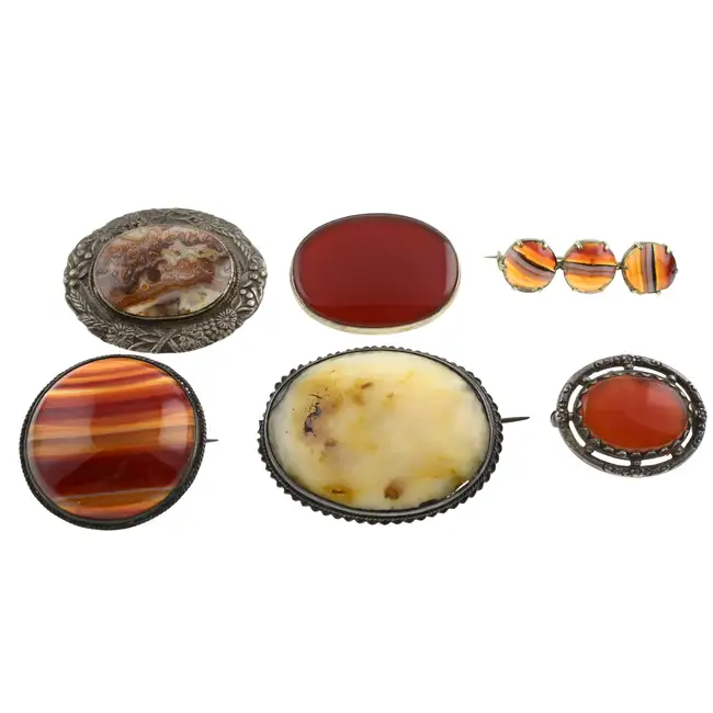 Seven late 19th c. & later gem-set brooches