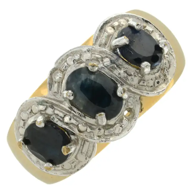 Sapphire three-stone ring, with diamond accent