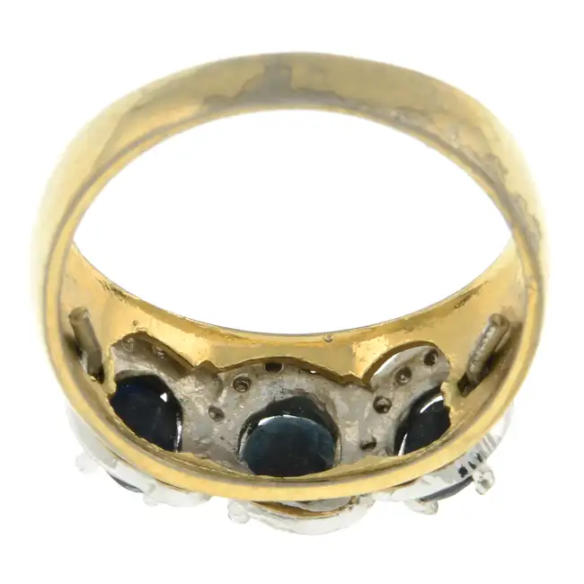 Sapphire three-stone ring, with diamond accent