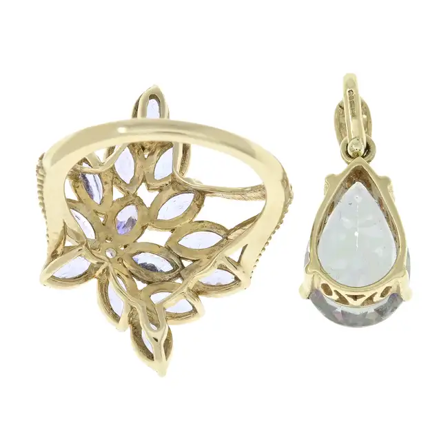 9ct gold tanzanite ring & coated topaz pendant