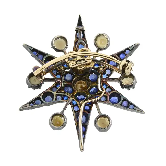 Victorian sapphire and split pearl star brooch