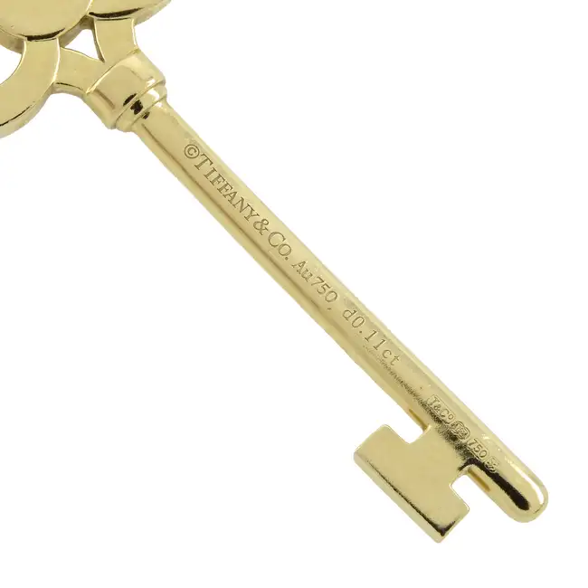 18ct gold diamond 'Crown' key pendant, by Tiffany & Co.