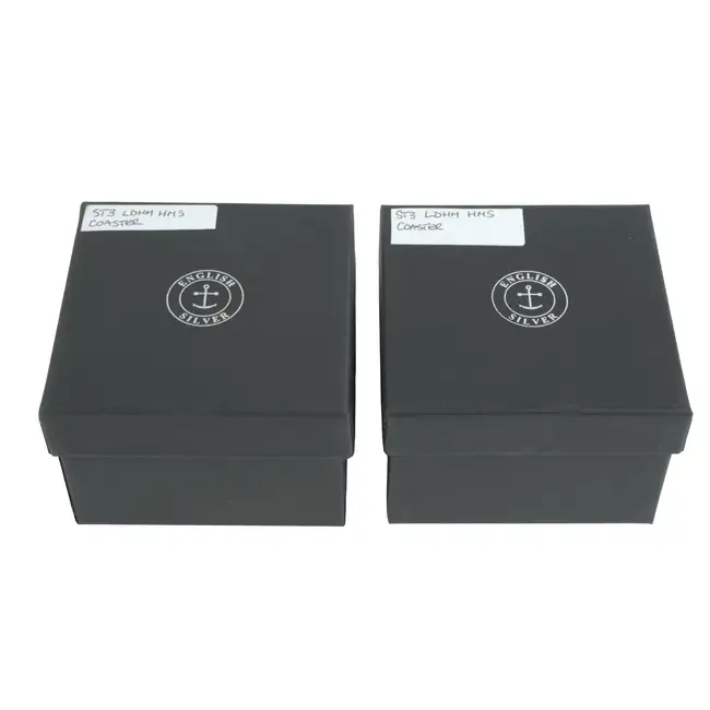 Pair of small contemporary silver mounted coasters 