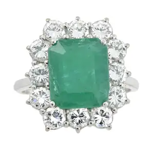 Emerald and diamond cluster ring