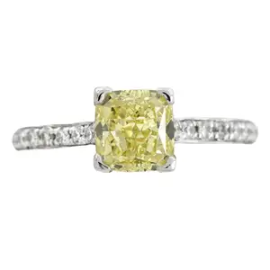 Platinum 'yellow' diamond and diamond ring