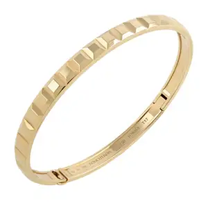 'Quatre Clou de Paris' bangle, by Boucheron