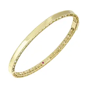 Gold 'Symphony Princess' bangle, by Roberto Coin