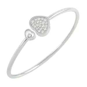 Gold diamond 'Happy Hearts' bangle, by Chopard