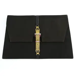 1940s black fabric clutch with 14ct gold gem clasp