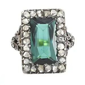 Green tourmaline and diamond point ring