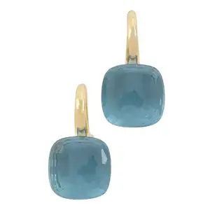 Blue topaz 'Nudo' earrings, by Pomellato