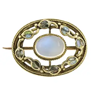 Gold moonstone and enamel brooch, by Liberty & Co.