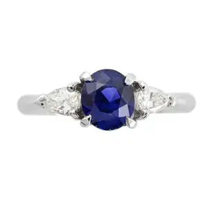 Platinum sapphire and pear-shape diamond ring
