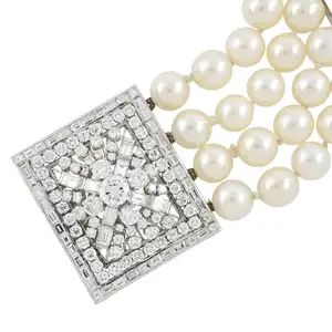 Cultured pearl four-row bracelet with diamond clasp