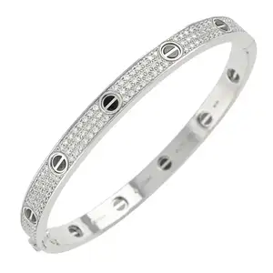 Diamond and ceramic 'Love' bangle, by Cartier