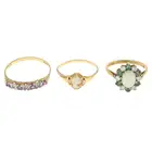 Three 9ct gold gem-set rings