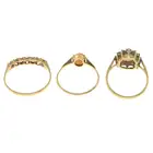 Three 9ct gold gem-set rings