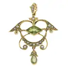 Early 20th century peridot & split pearl brooch