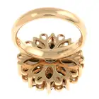 18ct gold diamond & black gem floral spinner ring