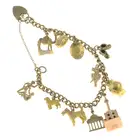 Mid 20th 9ct gold charm bracelet, with charms